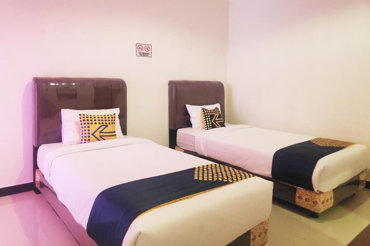 Oyo 2220 Pink'S Guest House Tarutung Экстерьер фото